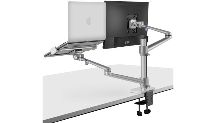 chrome dual monitor stand with two separate mounts supporting a monitor and a laptop