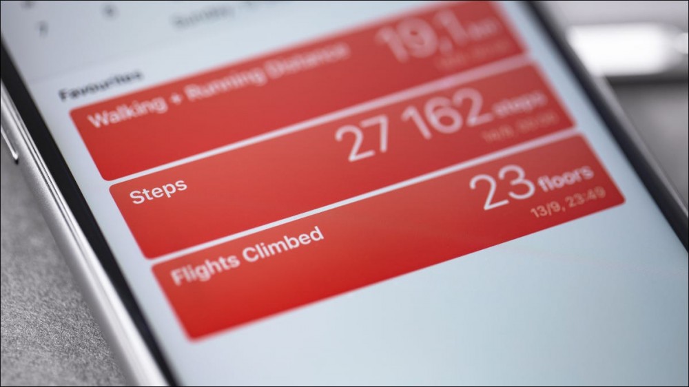 Closeup of an iPhone's screen, showing a step counter.