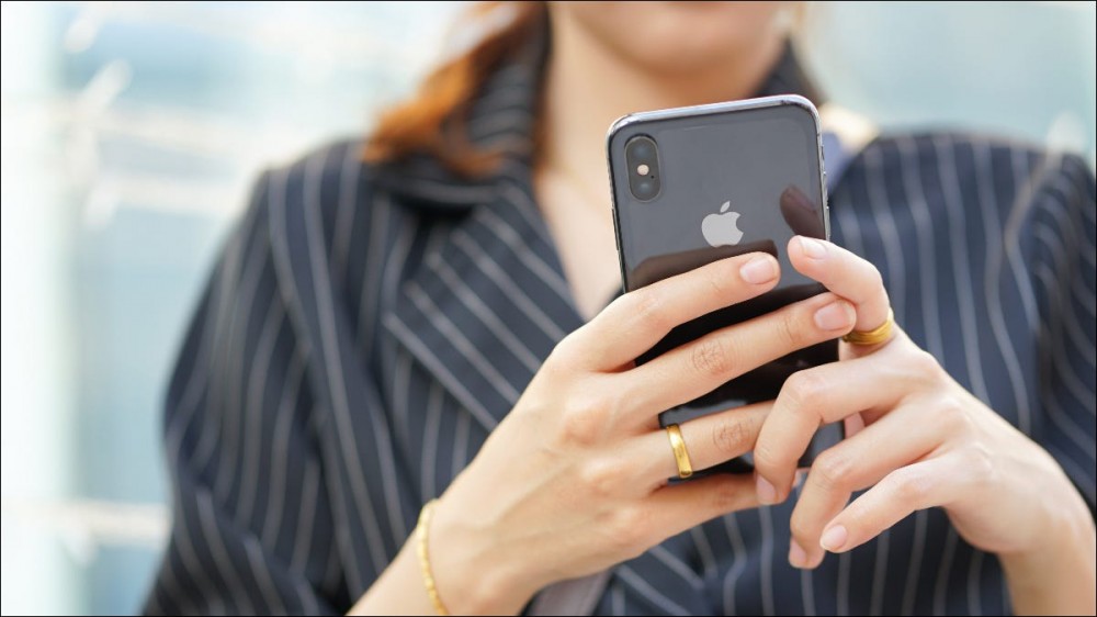 Woman holding iPhone