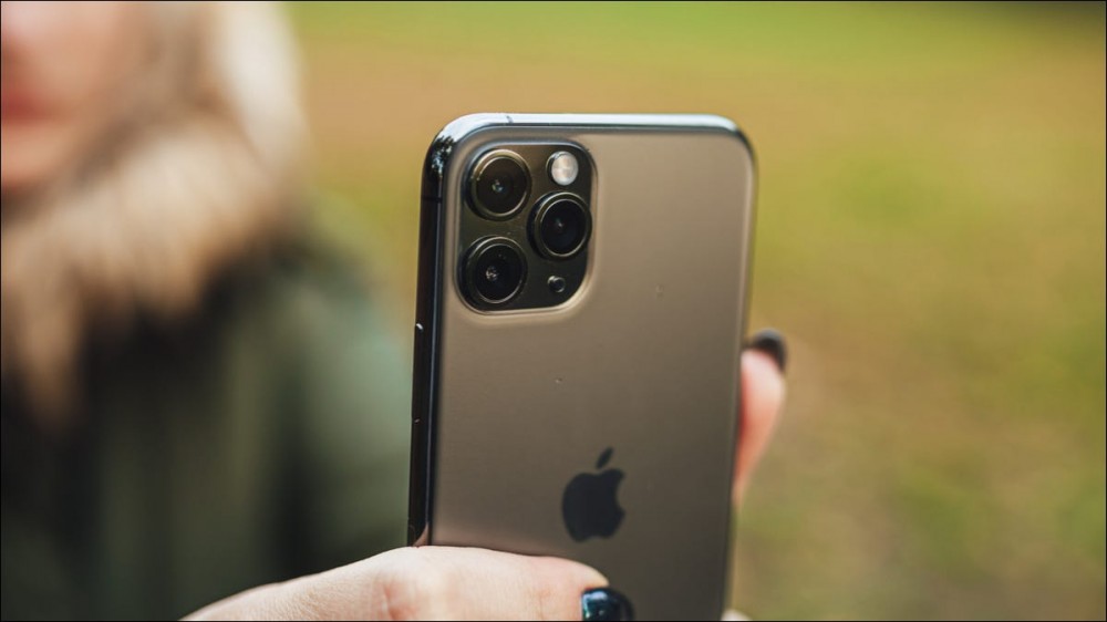 iPhone camera being held