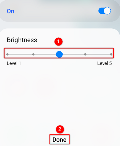 Adjust the flashlight brightness and tap "Done."