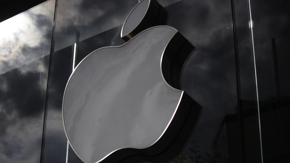 A photo of the Apple logo outside an Apple Store.