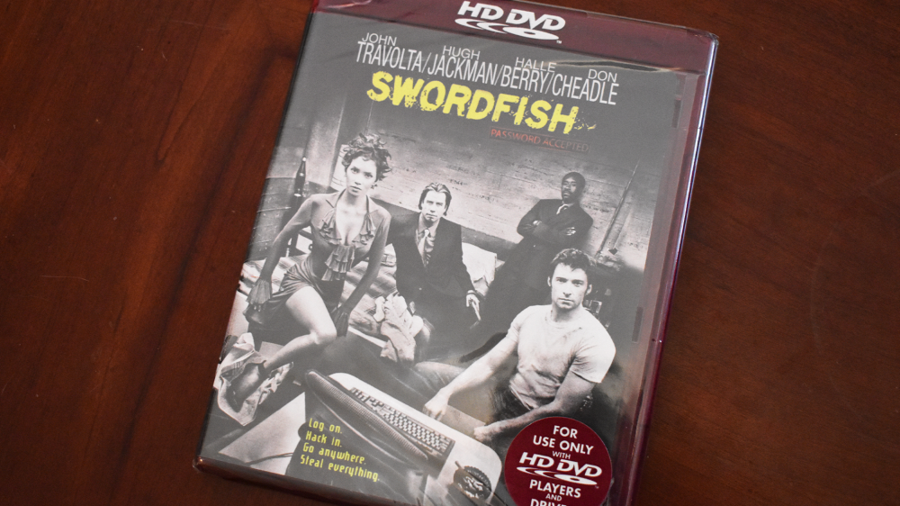 An HD DVD copy of 'Swordfish' on a tv stand