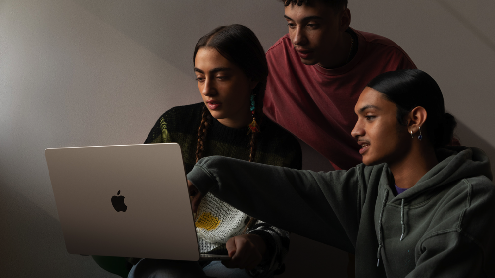 Group of people using Apple MacBook Air 15-Inch