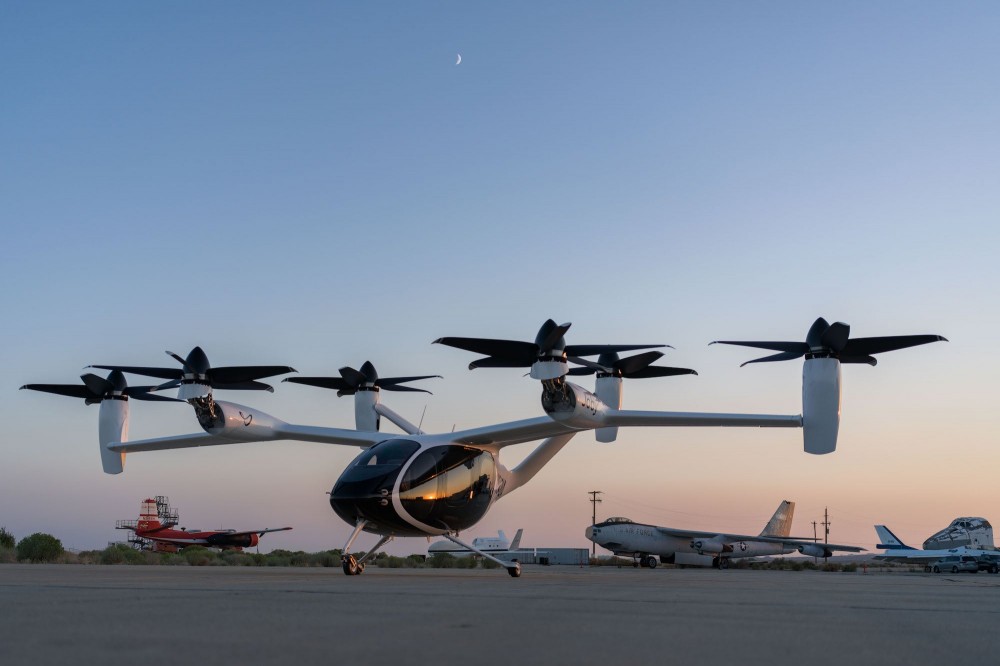 All of the aircraft's six propellers can tilt, to allow it to take off or land vertically, but then fly like a regular airplane.