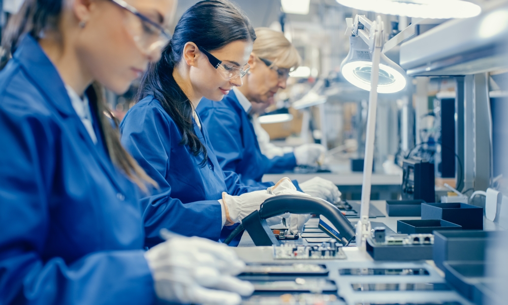 Factory Workers Assembling Electronics Production Manufacturing