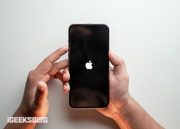 Pressing the Side and Volume Up buttons to restart an iPhone.
