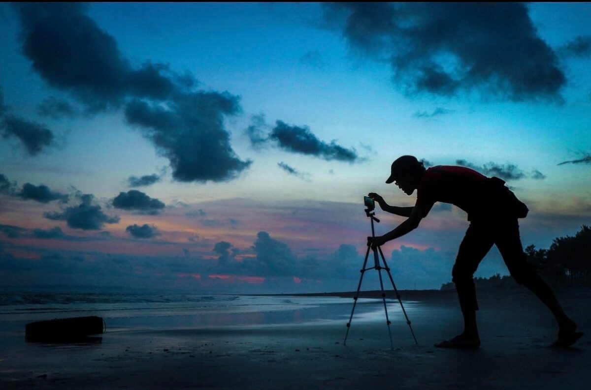 Mount your phone on a tripod